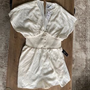 Brand new express romper size small